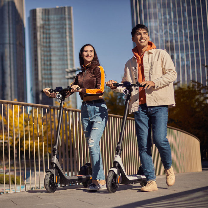 NIU KQI2 Pro Electric Scooter Lifestyle Walking