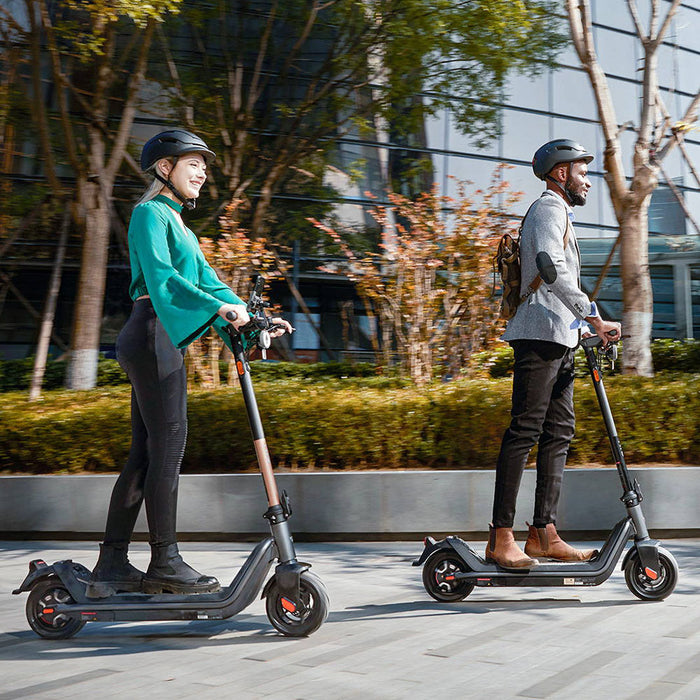 NIU KQI3 Pro Electric Scooter Lifestyle Riding Couple