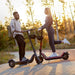 NIU KQI3 Sport Electric Scooter Lifestyle Static Couple